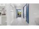 Entryway with wood floors, barn door feature and an open view to the outside at 6591 Cagliari Court, Myrtle Beach, SC 29572