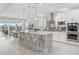 Spacious kitchen with an island, modern appliances, and ample counter space at 6591 Cagliari Court, Myrtle Beach, SC 29572