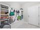 Functional mudroom with built-in shelving, hooks, and bench, ideal for organizing pet supplies and outdoor gear at 6591 Cagliari Court, Myrtle Beach, SC 29572