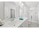 Clean, modern bathroom featuring double sinks, a glass-enclosed shower, and plenty of light at 662 Wallace Dr., Little River, SC 29566