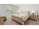 Cozy bedroom featuring a comfortable bed, natural light, and matching nightstands at 662 Wallace Dr., Little River, SC 29566