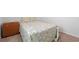 Nicely decorated bedroom with a floral print comforter and carpeted floor at 662 Wallace Dr., Little River, SC 29566