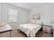 Comfortable bedroom with natural light, a bed, dresser, and soothing wall art at 662 Wallace Dr., Little River, SC 29566