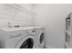 Practical laundry area featuring modern LG washer and dryer with storage shelves at 662 Wallace Dr., Little River, SC 29566