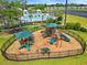 Community playground area with multiple slides, climbing features and protective canopies at 662 Wallace Dr., Little River, SC 29566