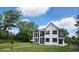 Two-story home with covered porches and a manicured lawn, perfect for peaceful living at 675 Liberty Church Rd., Loris, SC 29569