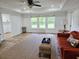 Sunlit living room with hardwood floors, a large window, and stylish decor at 675 Liberty Church Rd., Loris, SC 29569