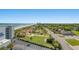 Aerial view of the neighborhood near the ocean, with some buildings visible, clear blue skies, sunny weather, and palm trees at 6804 N Ocean Blvd. # 1049, Myrtle Beach, SC 29572