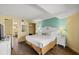 The bedroom features a comfortable bed, soft lighting from bedside lamps, and a closet for storage, providing a relaxing space at 6804 N Ocean Blvd. # 1049, Myrtle Beach, SC 29572