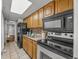 Efficient kitchen with stainless steel appliances and updated cabinets at 6804 N Ocean Blvd. # 1133, Myrtle Beach, SC 29572