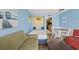 Comfortable condo interior with living room, dining table and kitchen access at 6804 N Ocean Blvd. # 1133, Myrtle Beach, SC 29572