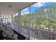 Spacious balcony with nice seating and open views of the wooded property at 719 Shearwater Ct. # 301, Murrells Inlet, SC 29576