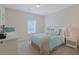 A quaint bedroom with matching lamps and beach-themed pillows at 719 Shearwater Ct. # 301, Murrells Inlet, SC 29576