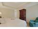 Spacious main bedroom features a tray ceiling, a large wardrobe, and comfortable seating at 719 Shearwater Ct. # 301, Murrells Inlet, SC 29576