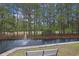 Picturesque pond view with fountain, lush trees, and a calming park bench at 719 Shearwater Ct. # 301, Murrells Inlet, SC 29576