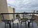 Balcony area with chairs overlooking the ocean at 7500 N Ocean Blvd. # 6120, Myrtle Beach, SC 29572