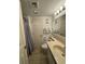 Bathroom with a sink, mirror, toilet, and bathtub with shower curtain at 7500 N Ocean Blvd. # 6120, Myrtle Beach, SC 29572