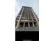 High-rise building featuring private balconies on each floor, street parking, and accessibility parking spaces at 7500 N Ocean Blvd. # 6120, Myrtle Beach, SC 29572
