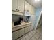 Compact kitchen featuring essential appliances and ample counter space at 7500 N Ocean Blvd. # 6120, Myrtle Beach, SC 29572