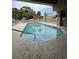 Outdoor swimming pool surrounded by lounge chairs with some landscaping at 7500 N Ocean Blvd. # 6120, Myrtle Beach, SC 29572
