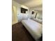 Nicely decorated bedroom with a flat-screen TV, and mirrored closet doors at 7509 N Ocean Blvd. # 1205, Myrtle Beach, SC 29572