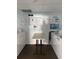 Common laundry room with modern washing machines, dryers, and a folding table at 7509 N Ocean Blvd. # 1205, Myrtle Beach, SC 29572