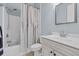 Bright bathroom with a tub and shower combo and white vanity at 830 Shine Ave. # 28 R8, Myrtle Beach, SC 29577
