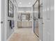 Elegant bathroom with double vanity, tile flooring, framed mirrors and a glass-enclosed shower at 830 Shine Ave. # 28 R8, Myrtle Beach, SC 29577