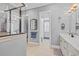 Luxurious bathroom showcasing glass shower, double doors, vanity, and coastal decor at 830 Shine Ave. # 28 R8, Myrtle Beach, SC 29577