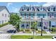 Charming townhome with a covered front porch and colorful shutters in a well-maintained community at 830 Shine Ave. # 28 R8, Myrtle Beach, SC 29577
