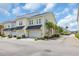 Charming townhome exterior with attached garage and well-maintained landscaping at 830 Shine Ave. # 28 R8, Myrtle Beach, SC 29577