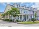 Attractive townhome exteriors with a welcoming porch, lush landscaping, and inviting curb appeal at 830 Shine Ave. # 28 R8, Myrtle Beach, SC 29577