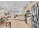 Open eat-in kitchen featuring stainless steel appliances, granite countertops, and a gas range at 830 Shine Ave. # 28 R8, Myrtle Beach, SC 29577