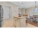 Kitchen island features granite countertops, pendant lighting, and seating at 830 Shine Ave. # 28 R8, Myrtle Beach, SC 29577