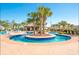 A long winding lazy river with surrounding foliage and palm trees under a bright blue sky at 830 Shine Ave. # 28 R8, Myrtle Beach, SC 29577