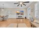 Spacious living room featuring wood floors, a large TV, and a stylish decor at 830 Shine Ave. # 28 R8, Myrtle Beach, SC 29577