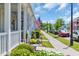 Neighborhood street view featuring well-maintained sidewalks, landscaping, and charming homes at 830 Shine Ave. # 28 R8, Myrtle Beach, SC 29577