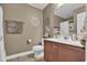 Bathroom featuring a vanity, toilet, mirror, and shower/tub combination at 9232 Goodwill Ct., Myrtle Beach, SC 29579
