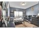 Teen bedroom with a gray color scheme featuring a desk, computer, and decorative items at 9232 Goodwill Ct., Myrtle Beach, SC 29579