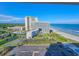 Stunning aerial view of the surrounding beach and the beautifully landscaped community at 9820 Queensway Blvd. # 1603, Myrtle Beach, SC 29572
