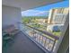 Enjoy the view of the landscape from the balcony with outdoor seating at 9820 Queensway Blvd. # 1603, Myrtle Beach, SC 29572