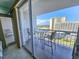 Relax on this private balcony with seating and enjoy views of the beautiful coastal landscape at 9820 Queensway Blvd. # 1603, Myrtle Beach, SC 29572