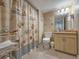 Cozy bathroom with shower, toilet, vanity, and decorative seashell shower curtain at 9820 Queensway Blvd. # 1603, Myrtle Beach, SC 29572