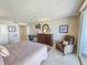 Comfortable bedroom setup with a desk, dresser, and accent chair at 9820 Queensway Blvd. # 1603, Myrtle Beach, SC 29572