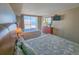Bright bedroom showcasing two beds with ocean view from large windows at 9820 Queensway Blvd. # 1603, Myrtle Beach, SC 29572