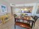 Cozy dining area with a glass-top table and an open layout that connects to the kitchen at 9820 Queensway Blvd. # 1603, Myrtle Beach, SC 29572