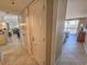 Hallway view leading into dining area and bedroom with tile floors at 9820 Queensway Blvd. # 1603, Myrtle Beach, SC 29572