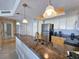 Modern kitchen features stainless steel appliances, granite countertops, and stylish pendant lighting at 9820 Queensway Blvd. # 1603, Myrtle Beach, SC 29572