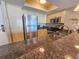 Well-equipped kitchen with stainless steel appliances, granite countertops, and ample storage space at 9820 Queensway Blvd. # 1603, Myrtle Beach, SC 29572