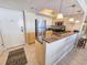 Modern kitchen featuring stainless steel appliances and granite countertops, perfect for cooking and entertaining at 9820 Queensway Blvd. # 1603, Myrtle Beach, SC 29572